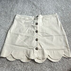 Cream button down mini skirt